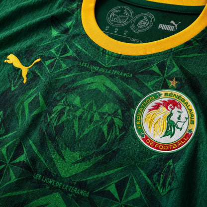 Camisola Senegal 2026 Alternativa Verde Floresta Jacquard Leões Gola Amarela Painéis Vermelhos Puma DRYCELL Edição Jogador S Camisola comprar online