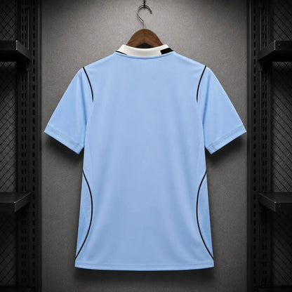 Camisola Uruguai 26 - 27 Principal Azul Celeste Gola Polo Creme Piping Preto Nike Dri - FIT Edição Adepto S Camisola comprar online
